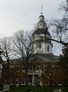Wreaths adorn the windows of Maryland's State House.